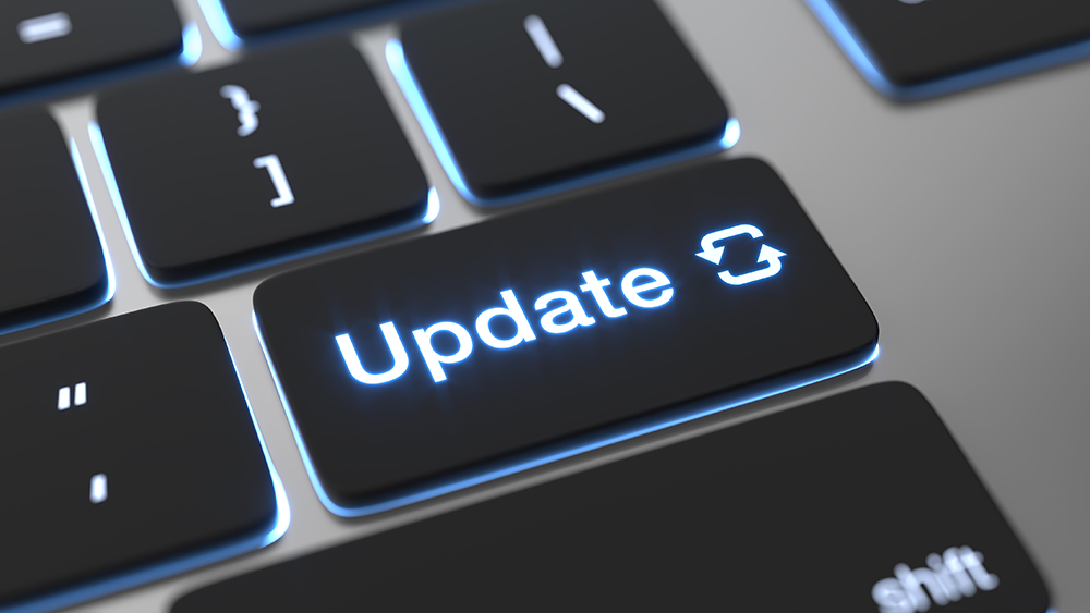 Web Dev- Close-up of a computer keyboard's 'Update' key, symbolizing the ongoing maintenance and updates required in the field of web development. 